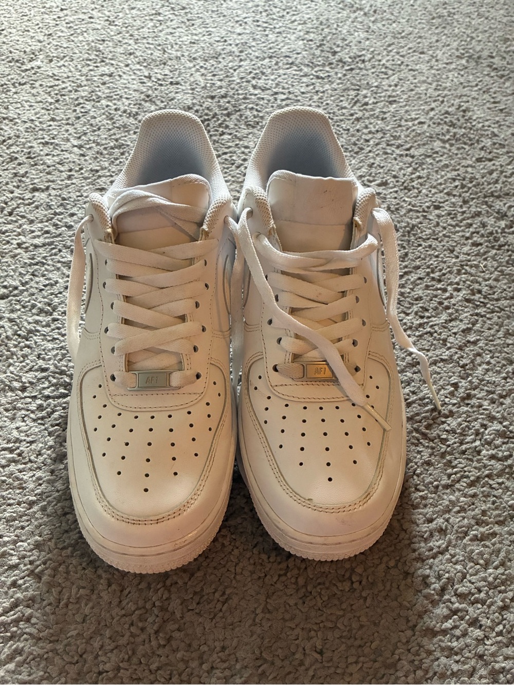 All-White Nike Air Force Sneakers